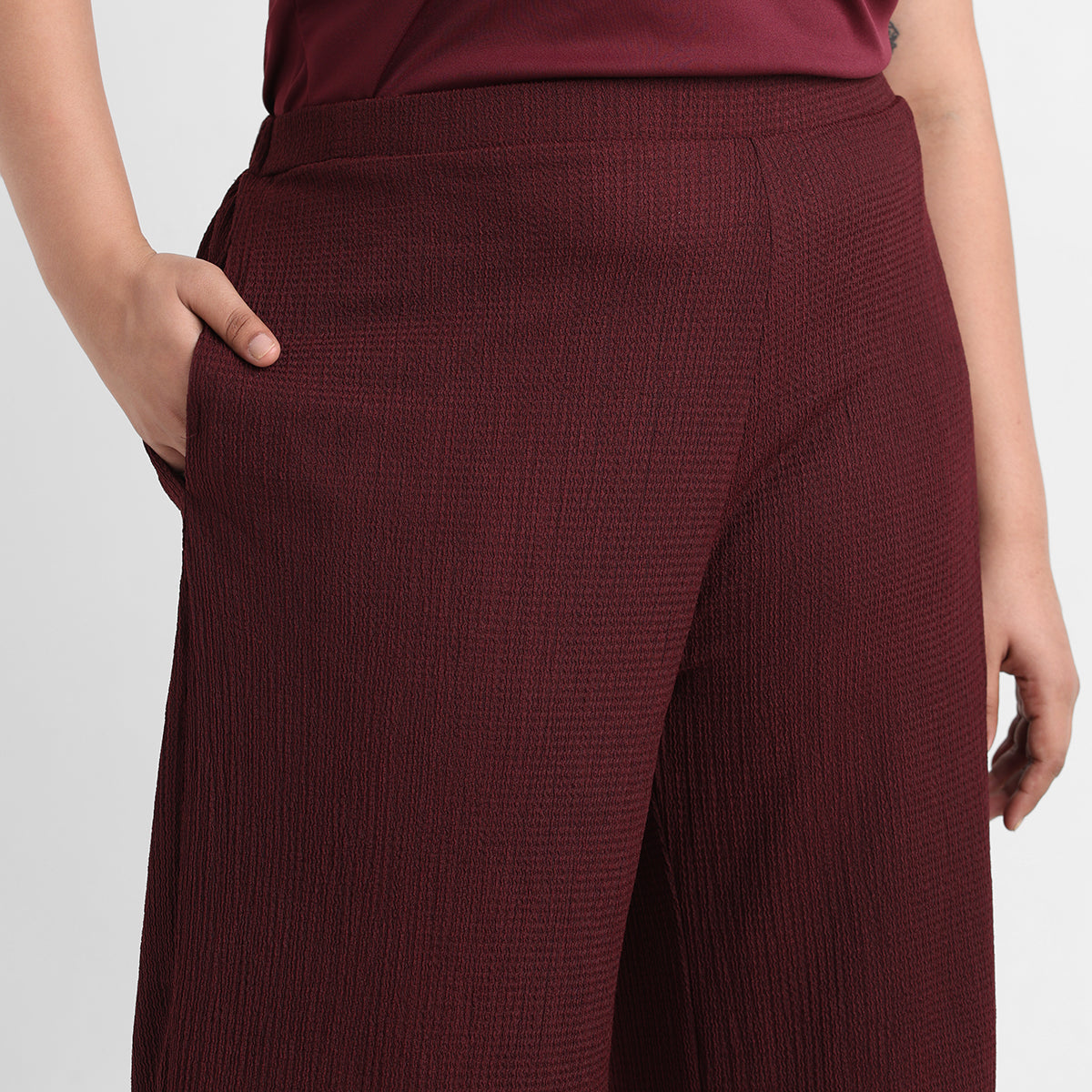 Maroon textured knit plus size flare pants