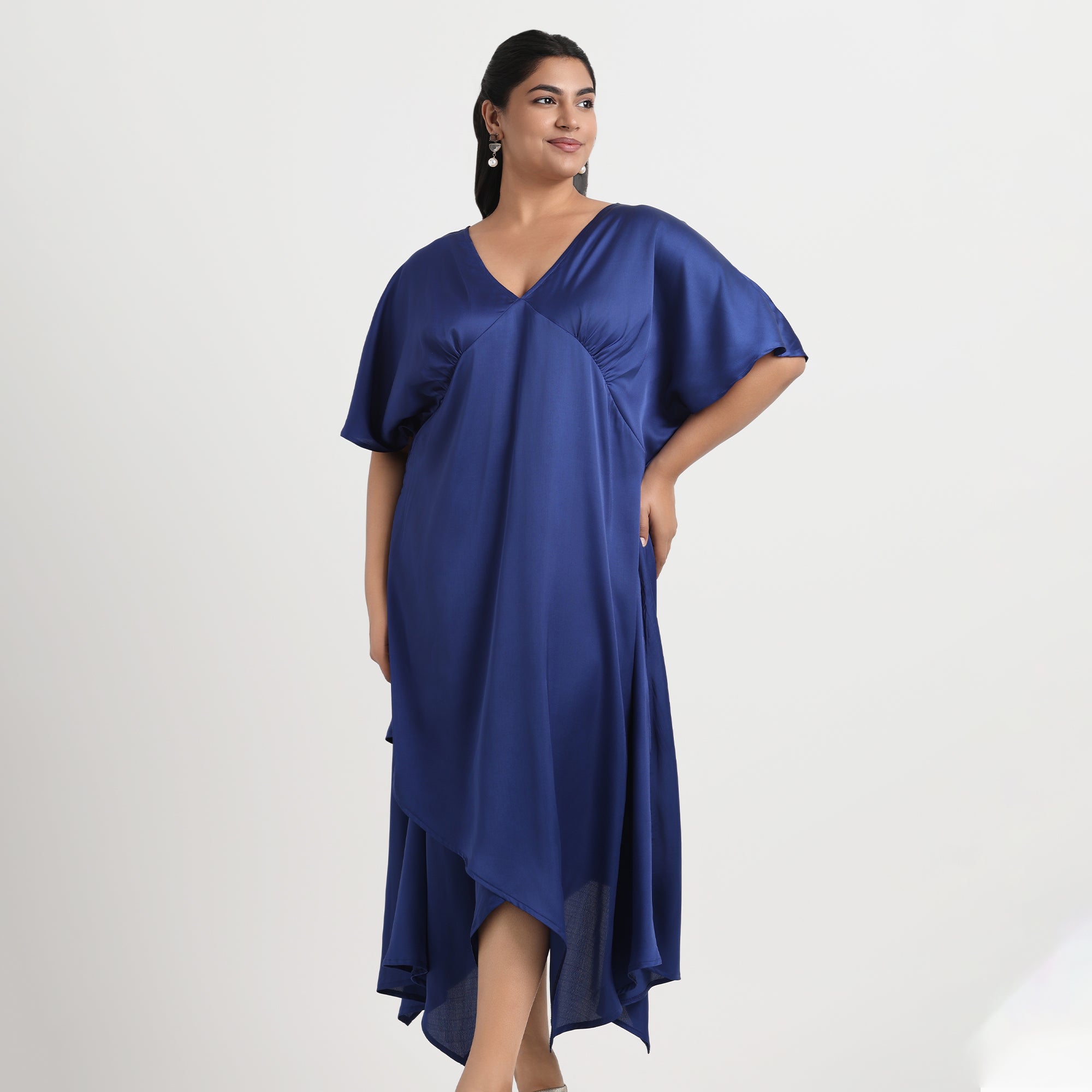 Blue satin dress with a glossy finish, designed for an elegant plus-size fit.
