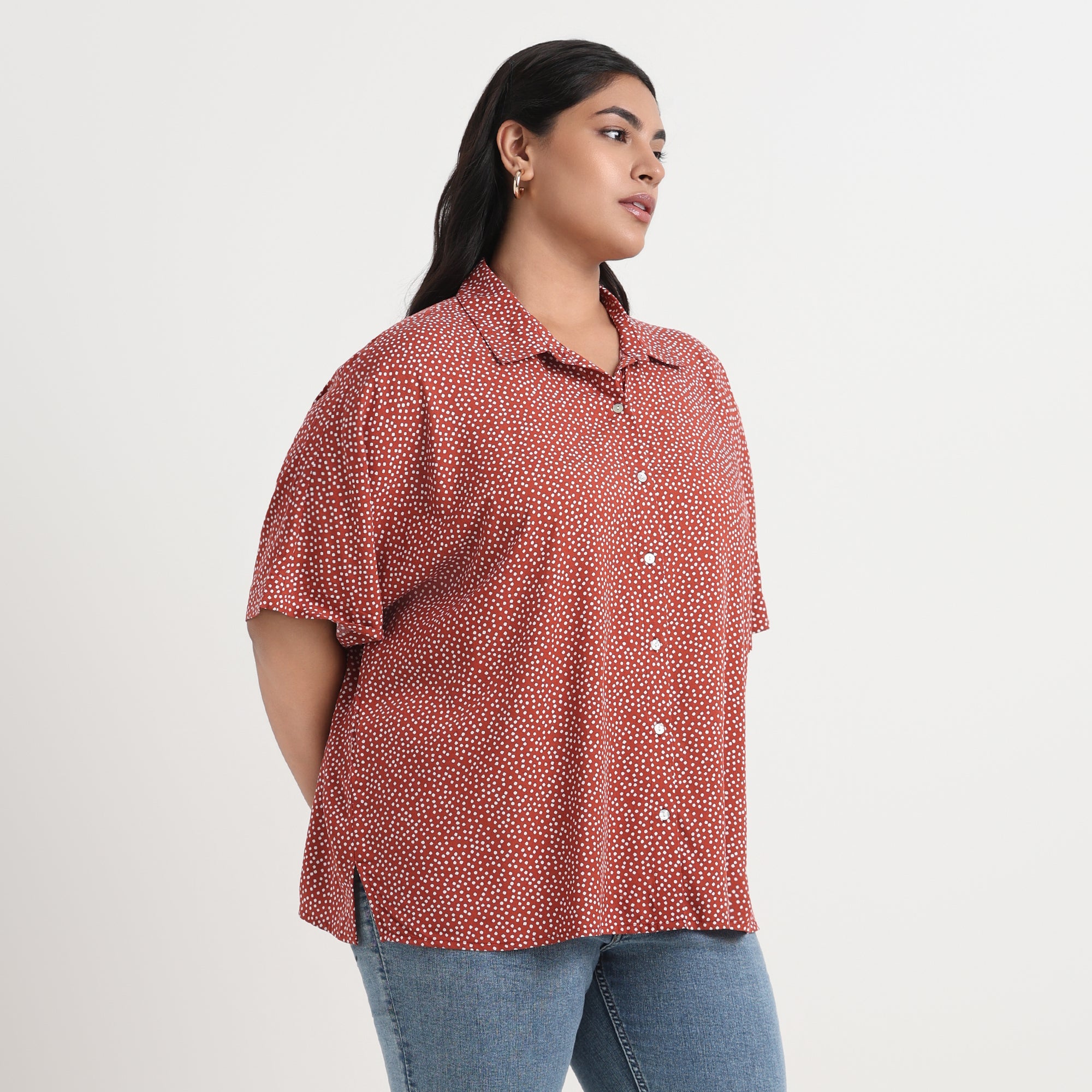 Brown drop-shoulder shirt with a relaxed fit and a soft, comfortable texture.
