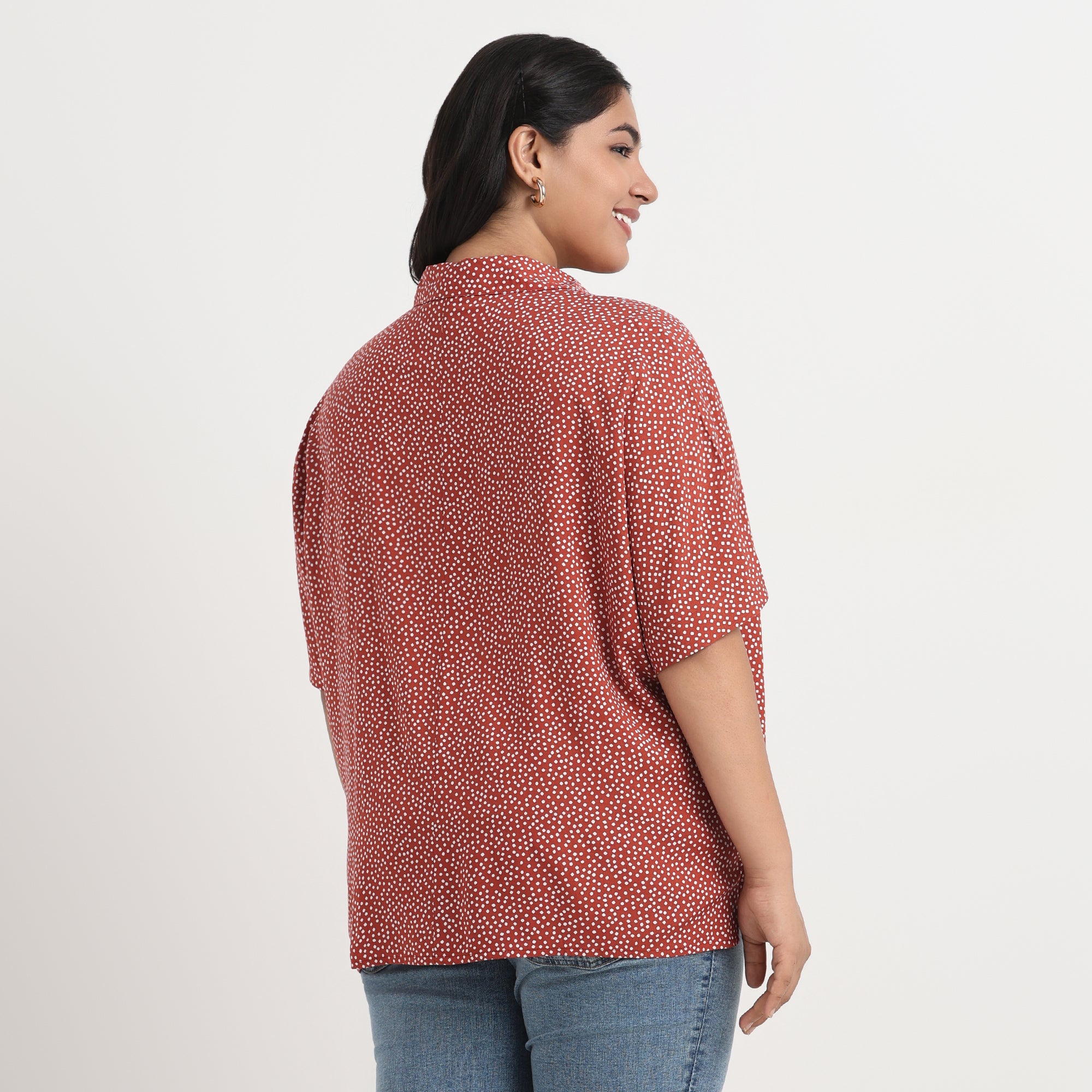 Brown drop-shoulder shirt with a relaxed fit and soft, comfortable fabric.
