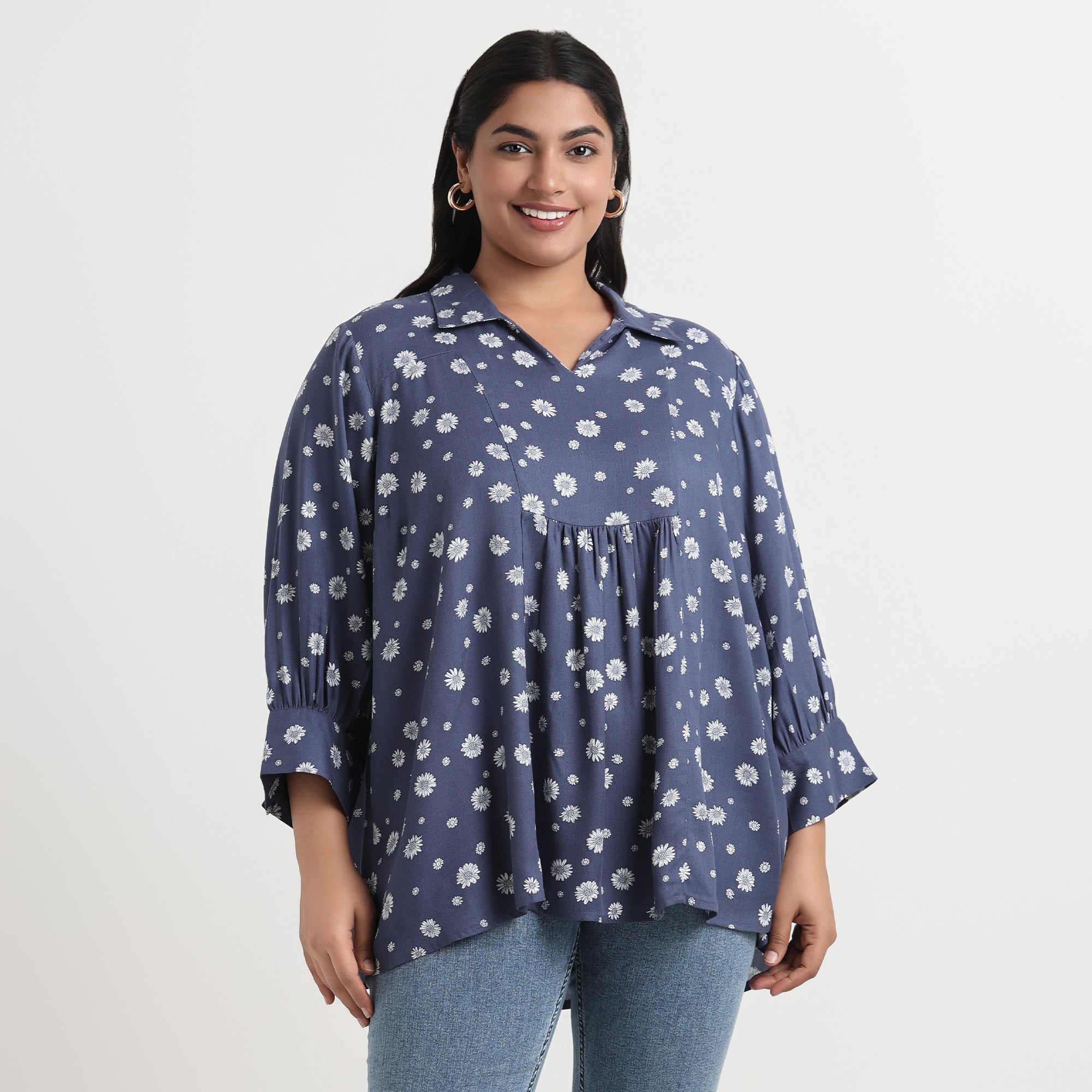 Button-down shirt with daisy prints, plus-size friendly
