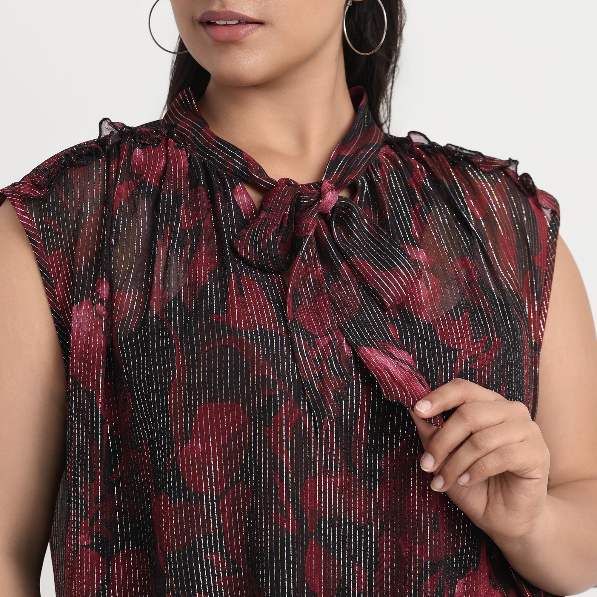 Plus-size red top with front tie detail, ideal for casual wear
