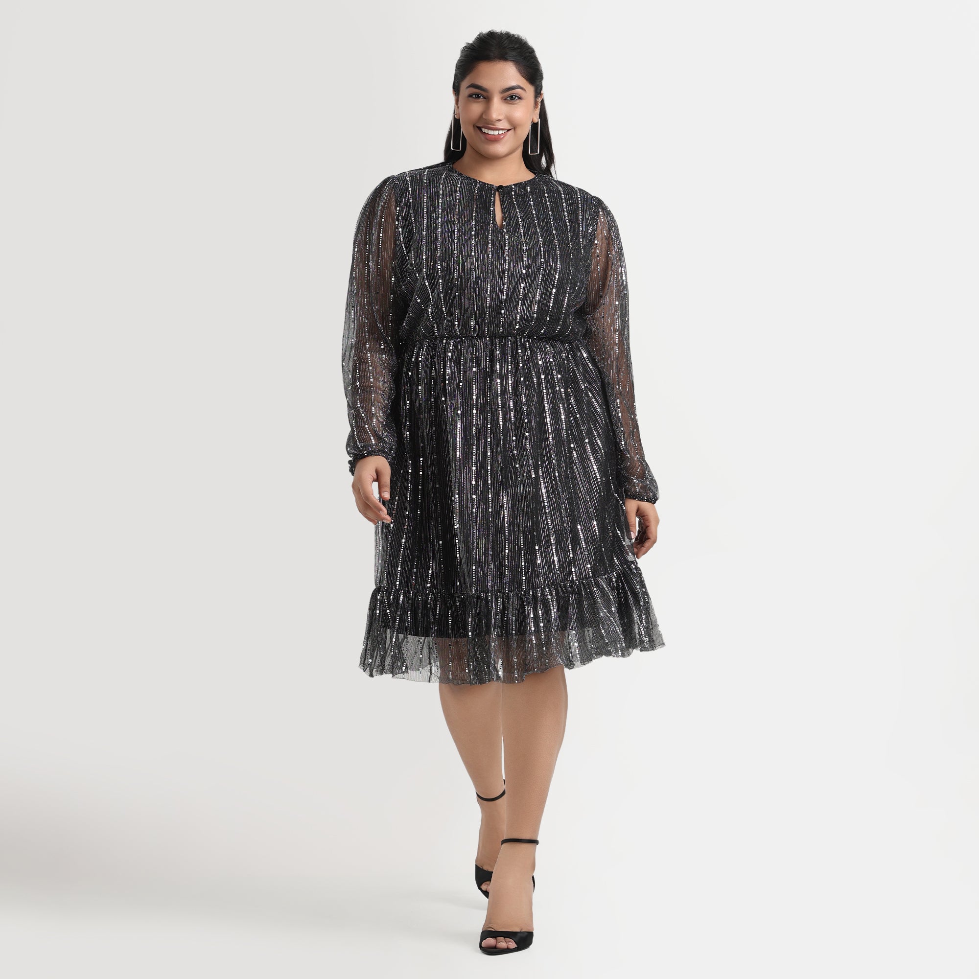 Stylish silver pleated dress, metallic finish for plus size fashion
