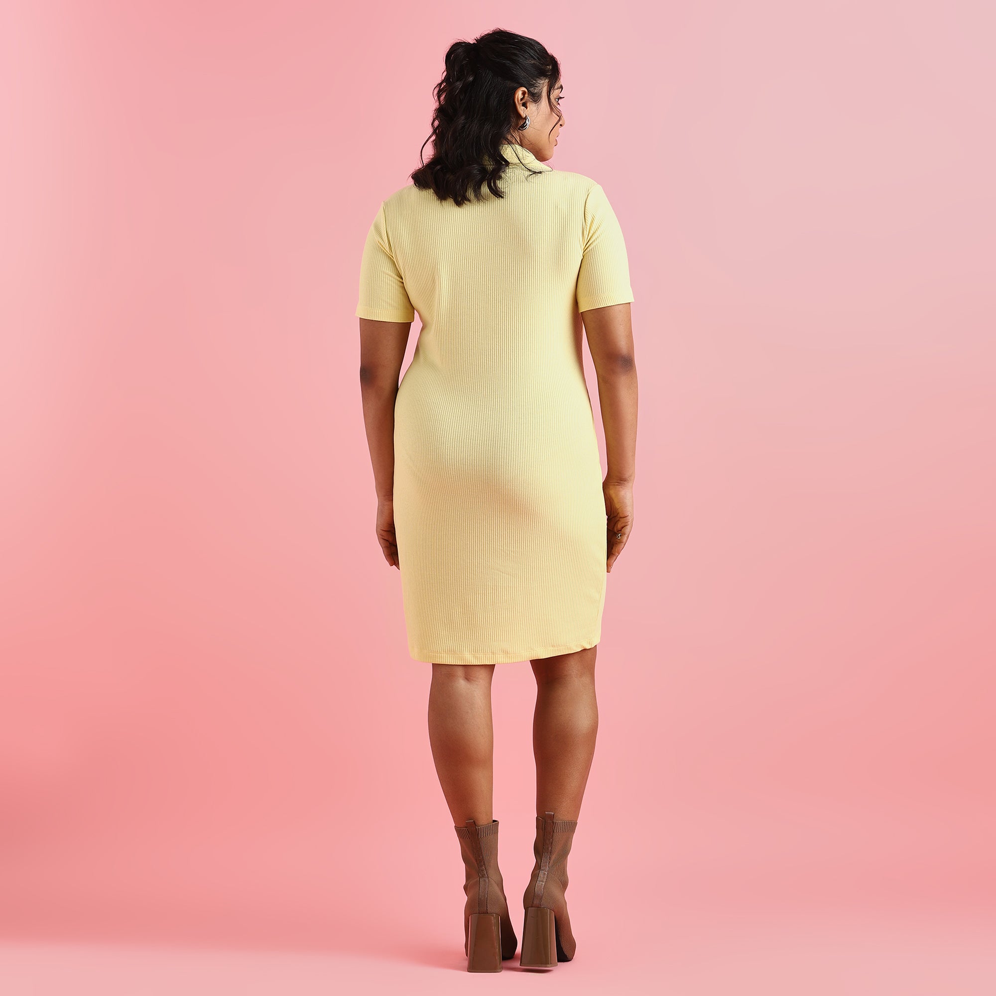 Image showcasing backside of Women wearing Yellow Rib Plus Size Dress