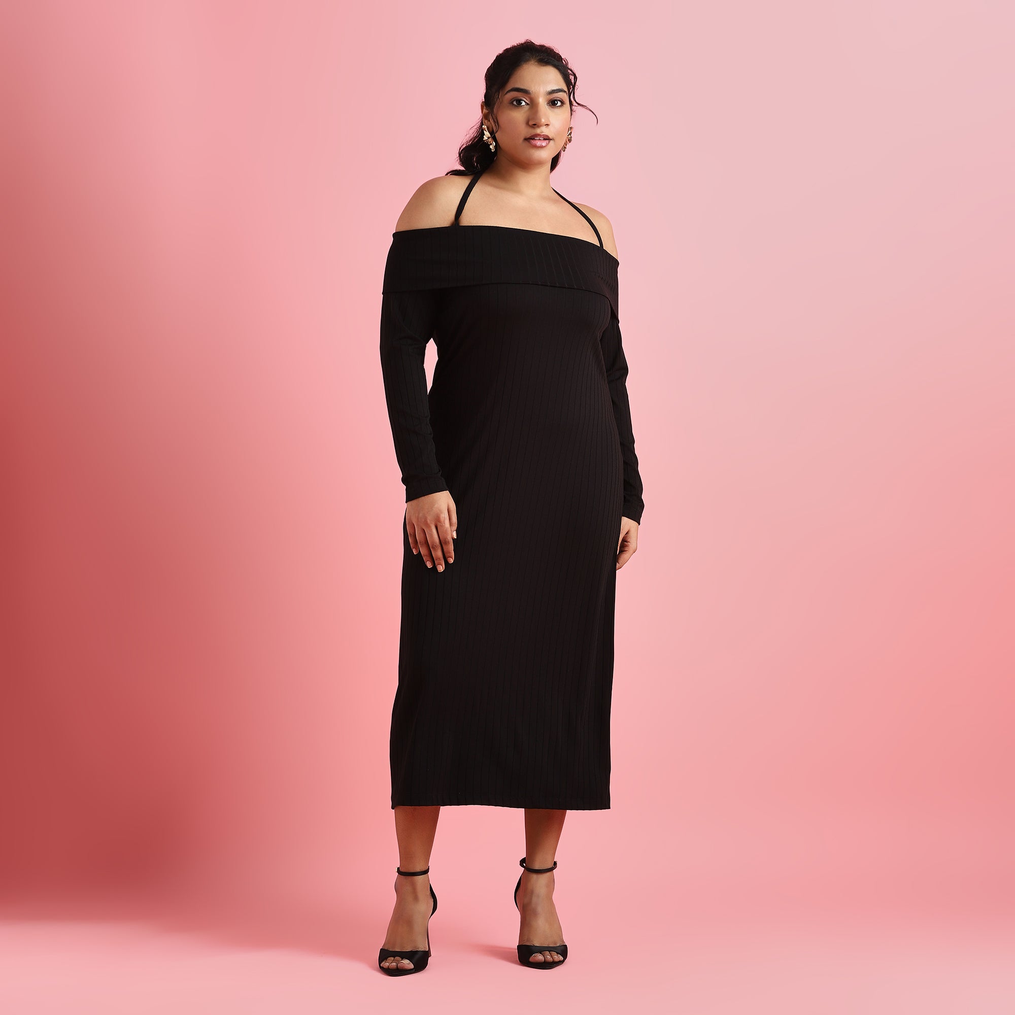 Image showcasing women wearing black rib bodycon dress