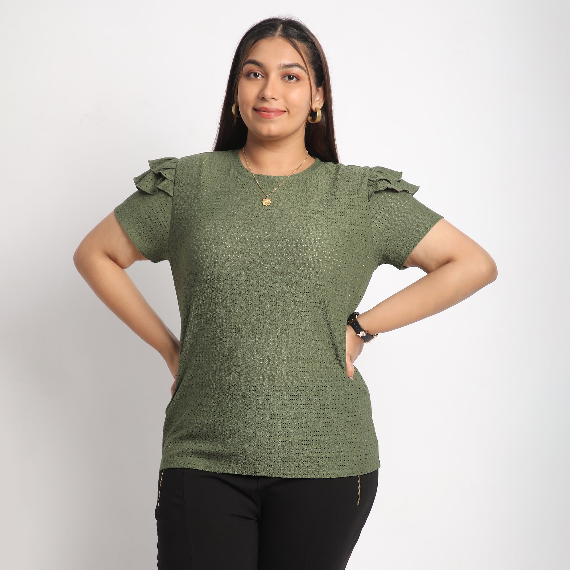 Image showcasing women wearing earth tone top with ruffle sleeves